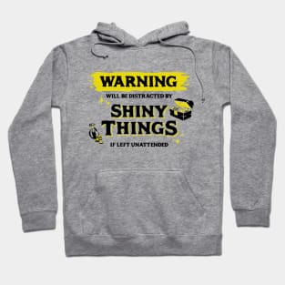 Distracted by Shiny Things  if Left Unattended Dark Yellow Warning Label Hoodie